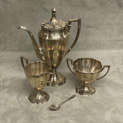 14 - A sterling silver 3 piece coffee set in the Adams Style of heavy gauge by Cooper Brothers & Sons Ltd... 