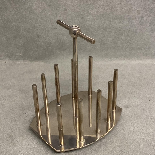 20 - A silver plated toast rack, designed by Dr C Dresser, with kite mark to base, a stamped designed by ... 