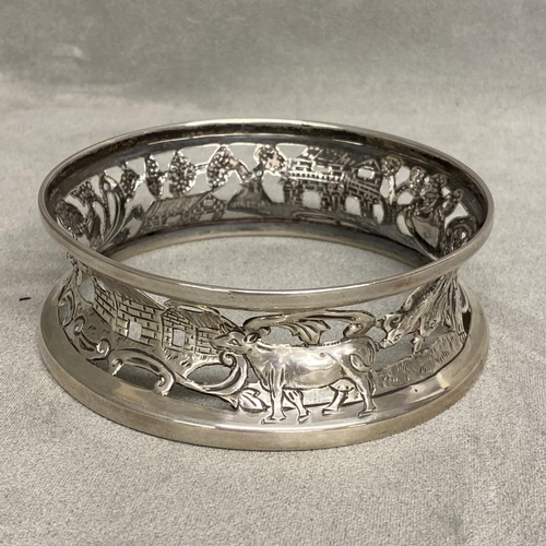 22 - An Irish silver dish ring with pierced naturalistic design by James Wakely and Frank Clarke Wheeler,... 