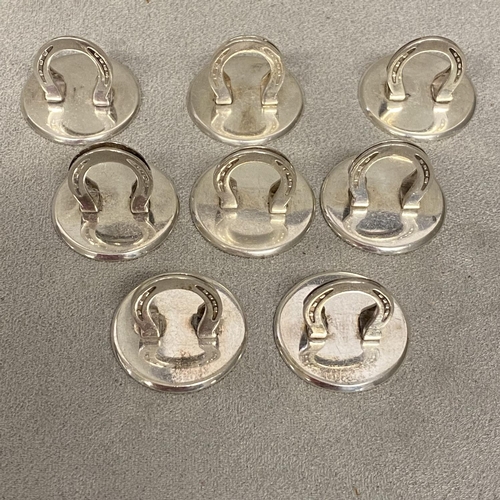 27 - Set of 8 sterling silver menu holders each modelled as a horse shoe, by Turner & Simpson, Birmingham... 