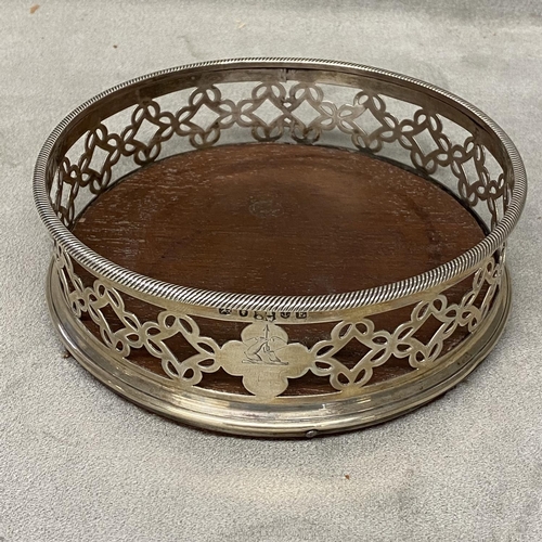 33 - Victorian sterling silver wine bottle coaster wooden base with pierced gallery, Birmingham 1853