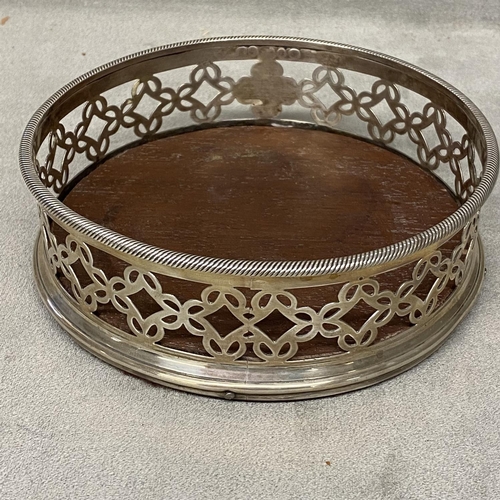 33 - Victorian sterling silver wine bottle coaster wooden base with pierced gallery, Birmingham 1853