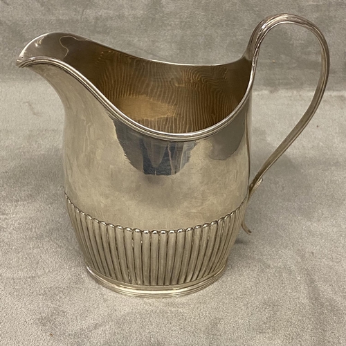 35 - Georgian sterling silver cream jug with half reeded decoration by Robert & David Hennel, 1815, 176g