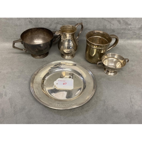 47 - A collection of sterling silver items to include a presentation plate, christening mug , cream jug a... 