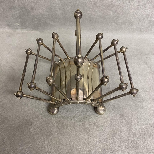 5 - A Hukin and Heath electroplated folded toast rack, designed by Dr Christopher Dresser Model number 2... 