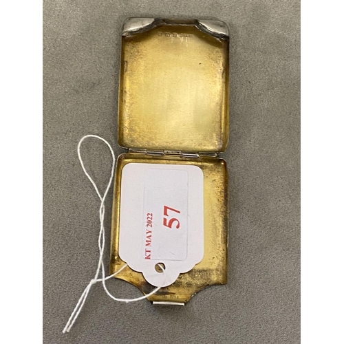 57 - A sterling silver stamp case with engine turned decoration and gilt interior