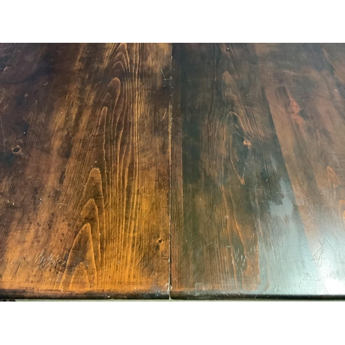 620 - Large rectangular extending dining table with 2 leaves, possibly stained pine top with oak base?,  o... 