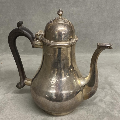 7 - A sterling silver coffee pot of bulbous form on circular base, Goldsmiths Silversmiths Company Ltd, ... 