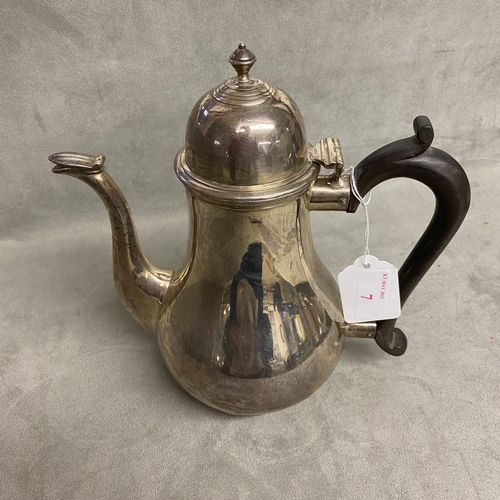 7 - A sterling silver coffee pot of bulbous form on circular base, Goldsmiths Silversmiths Company Ltd, ... 