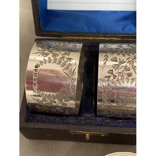 75 - A collection of Sterling silver napkin rings to include 3 boxed pairs and 3 single examples, various... 