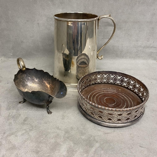 9 - Three items of silver plated wares to include sauceboat, wine coaster and large mug