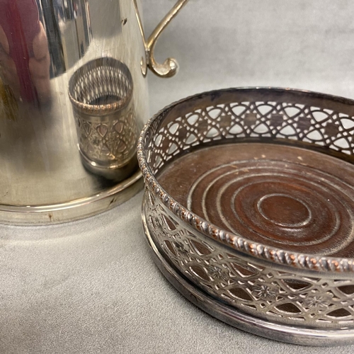 9 - Three items of silver plated wares to include sauceboat, wine coaster and large mug