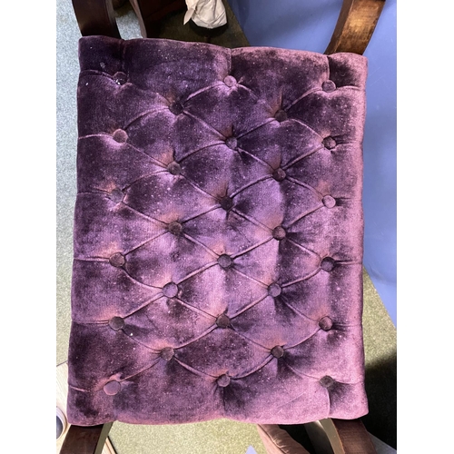 624 - A mahogany piano stool, with purple button backed upholstery