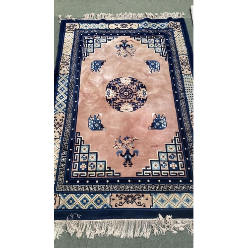 653 - Cream Laura Ashley Isodore rug, wooll pile 159 x 229cm, and a pink and blue wool Chinese rug KAYM