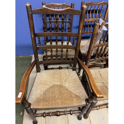 467 - Eight ladder back, rush seated country chairs, (6 +2); some wear to the rush seats