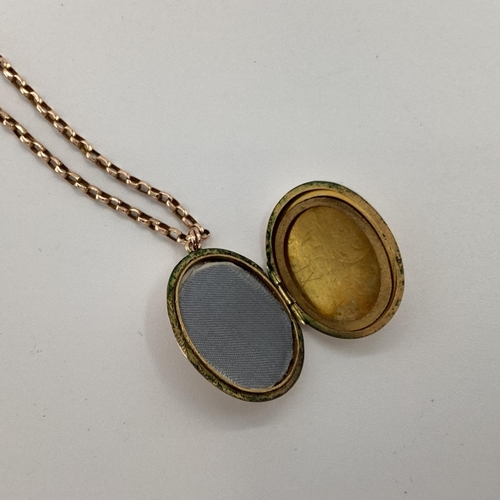 102 - 9ct gold back and front oval locket on a 9ct gold belcher link necklace, gross 8g; and a synthetic p... 