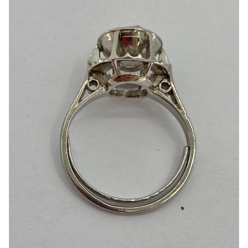 128 - Continental platinum and diamond single stone ring, in pierced halo setting, single rose cut diamond... 