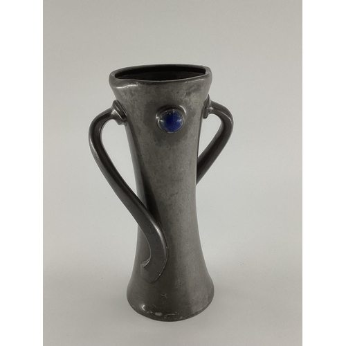 132 - Liberty & CO Tudric twist handled vase, set with 2 blue glass cabochons, by Oliver Baker, marked to ... 