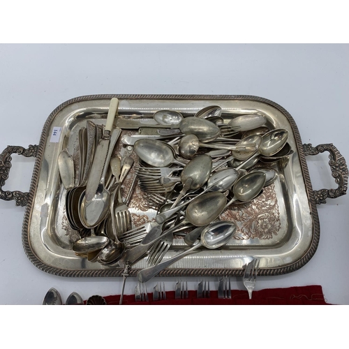 144 - Large two handled silver plated tray, a quantity of flatware , including some in a wooden box, some ... 