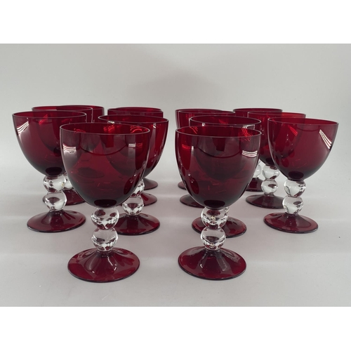 161 - Collection of cranberry glass glasses by Thomas Goode to include 14 white wine, 14 red wine glasses