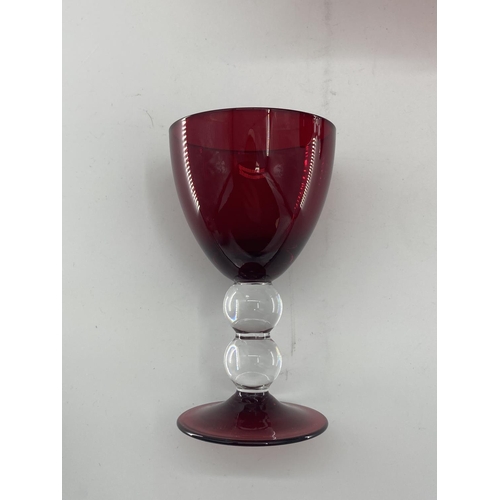 161 - Collection of cranberry glass glasses by Thomas Goode to include 14 white wine, 14 red wine glasses