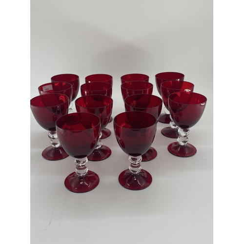 161 - Collection of cranberry glass glasses by Thomas Goode to include 14 white wine, 14 red wine glasses