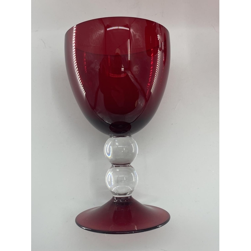 161 - Collection of cranberry glass glasses by Thomas Goode to include 14 white wine, 14 red wine glasses