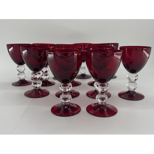 161 - Collection of cranberry glass glasses by Thomas Goode to include 14 white wine, 14 red wine glasses