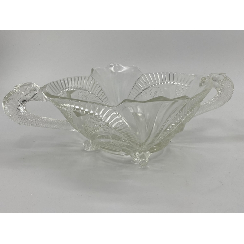 172 - Collection of late C19th early C20th pressed glass items, to include loop handled serving dishes and... 