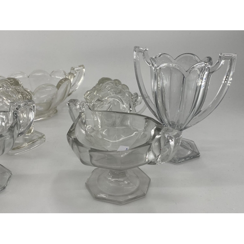 172 - Collection of late C19th early C20th pressed glass items, to include loop handled serving dishes and... 