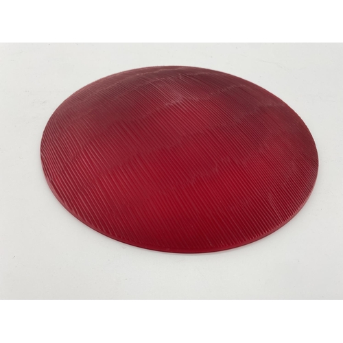 174 - A Nonfoux circular red glass plate, etched and dated to rim 86, approx 31cm diameter