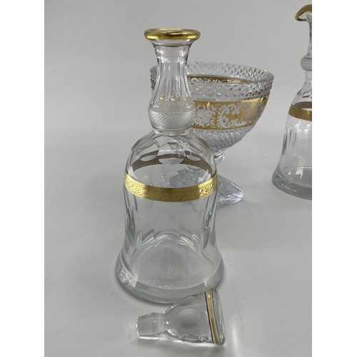 183 - Three gilt glass items to include a C19th Baccarat style decanter and stopper with matching jug, and... 