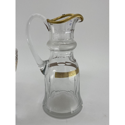 183 - Three gilt glass items to include a C19th Baccarat style decanter and stopper with matching jug, and... 