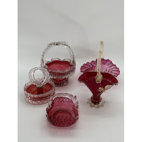 185 - A collection of late C19th/early C20th cranberry glass to include serving baskets