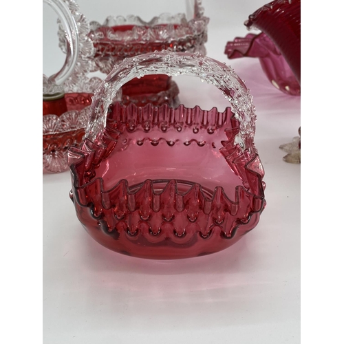 185 - A collection of late C19th/early C20th cranberry glass to include serving baskets