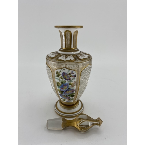 187 - A late C19th/early C20th flash cut glass decanter, Polychrome painted with floral panels. Condition:... 