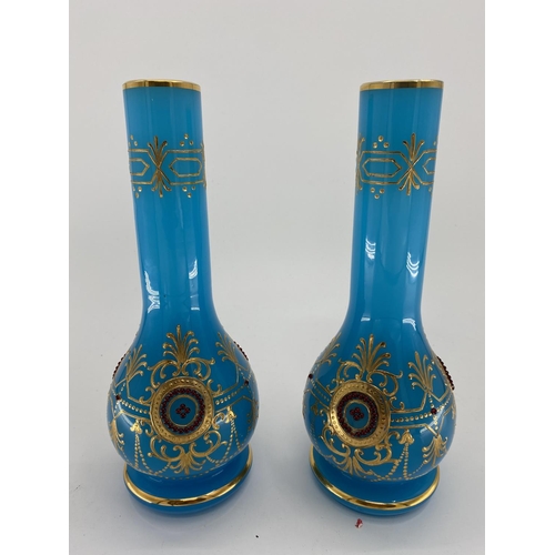 188 - A pair of French Opaline blue and gilt jewelled decorated vases and one other 31cm H. Condition: One... 