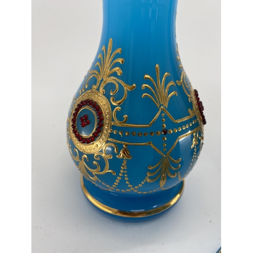 188 - A pair of French Opaline blue and gilt jewelled decorated vases and one other 31cm H. Condition: One... 