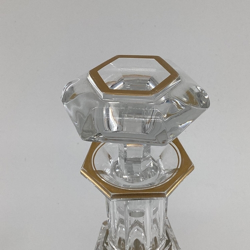 193 - A Baccarat glass decanter with gilt decoration marked to base 30cm, together with a square Baccarat ... 