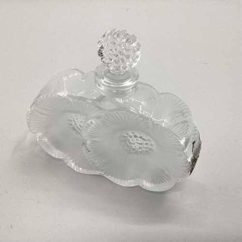 195 - A Lalique frosted glass perfume bottle of twin flower head design etched to base in original box, 10... 