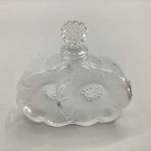 195 - A Lalique frosted glass perfume bottle of twin flower head design etched to base in original box, 10... 