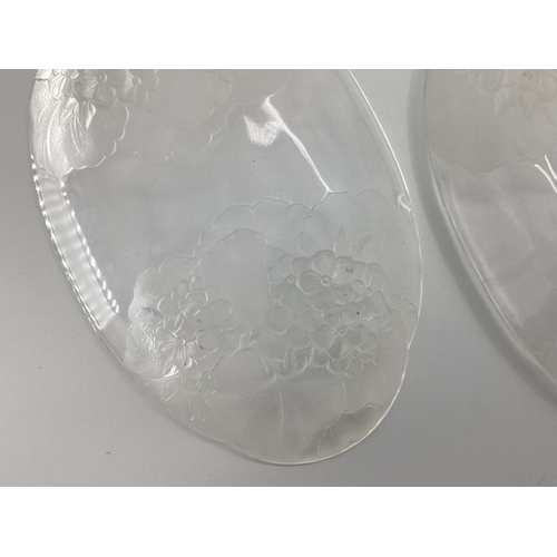 198 - Four frosted glass Lalique style dishes with leaf and flower design unsigned 24.5 x 15cm