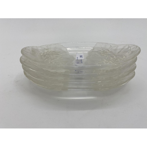 198 - Four frosted glass Lalique style dishes with leaf and flower design unsigned 24.5 x 15cm