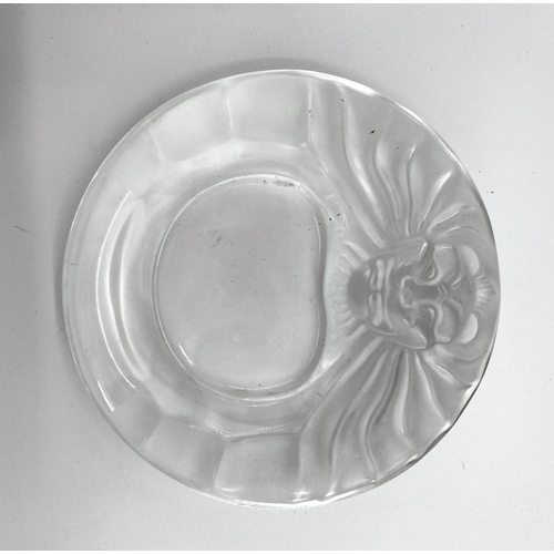 199 - A pair of Lalique frosted glass lion dishes no 10743 etched to base Lalique France, 14.5 cm (d). Con... 