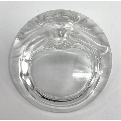 199 - A pair of Lalique frosted glass lion dishes no 10743 etched to base Lalique France, 14.5 cm (d). Con... 