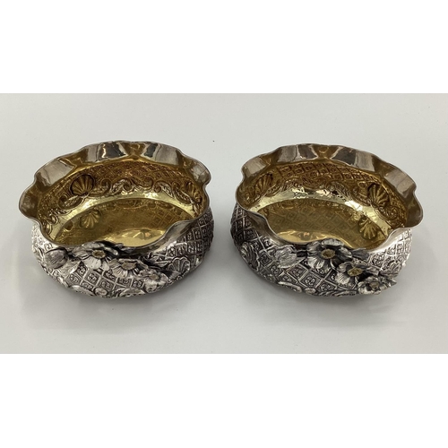 2 - A pair of Turkish silver bowls with cast floral decoration and gilt interior marked Melda Special 90... 