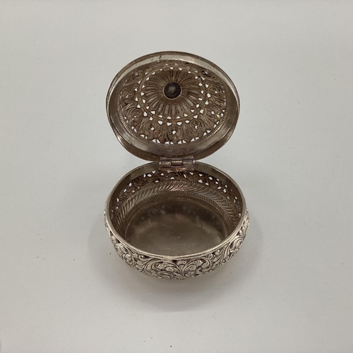 20 - A silver circular bowl with pierced hinged lid and body stamped 925, 320g, 11cm x 12cm