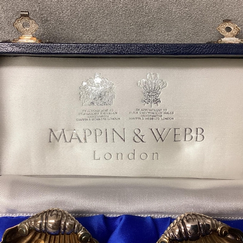 22 - Boxed pair of sterling silver salts and spoons of shell design by Mappin & Webb, London