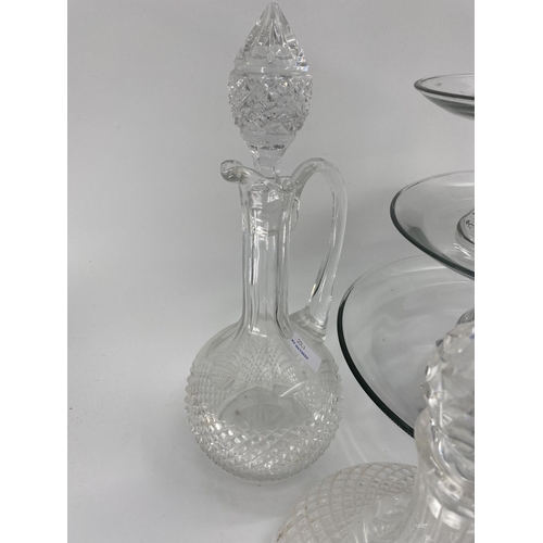 221 - Quantity of glass including modern cake platters on stands, cut glass decanters, wine glasses, tumbl... 