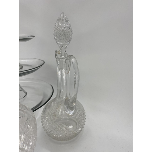 221 - Quantity of glass including modern cake platters on stands, cut glass decanters, wine glasses, tumbl... 